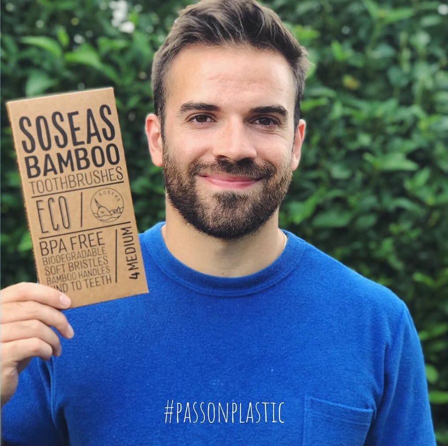 A man holding up a single-page Elementor bamboo bar.