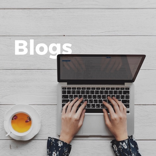 A woman typing on her laptop with a cup of coffee for optimal user experience.